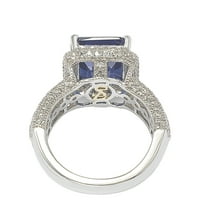 Prsten od srebra sa safirom i smaragdno izrezanim dijamantom